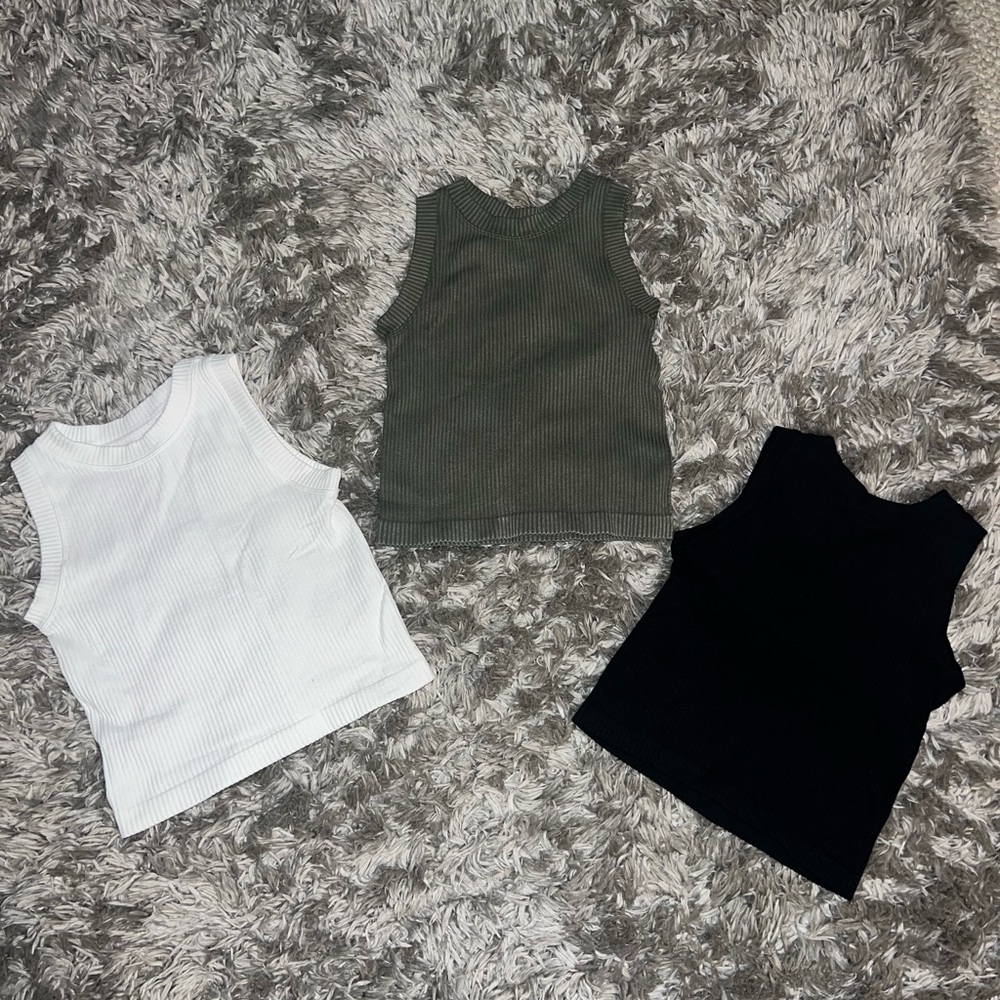 Three workout tanks !